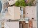 Birds-eye view showcasing a home's roof, backyard with desert landscaping, and surrounding neighborhood at 556 Decidedly St, Henderson, NV 89015