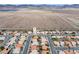 Overview of a residential neighborhood in a desert community with mountains in the background at 556 Decidedly St, Henderson, NV 89015