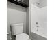 This bathroom offers a toilet and tub/shower combination with white tile, clean and functional at 556 Decidedly St, Henderson, NV 89015