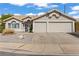 Charming single-story home with a two-car garage and desert landscaping at 556 Decidedly St, Henderson, NV 89015