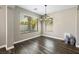 Cozy dining area with natural light and views of the landscaped yard at 5912 Hollowridge Rd, North Las Vegas, NV 89031