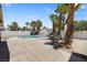 Private backyard pool with a spacious deck, perfect for relaxing and entertaining in a serene setting at 5912 Hollowridge Rd, North Las Vegas, NV 89031
