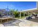 Backyard showcasing a covered patio and a trampoline for outdoor fun at 6021 Winter Meadow St, Las Vegas, NV 89130