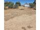 Empty backyard with view of shed at 626 Kimberly Ave, Pahrump, NV 89060