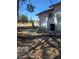 View of the backyard, showing the side of the property at 626 Kimberly Ave, Pahrump, NV 89060