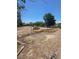 Expansive backyard with a chain-link fence and sparse vegetation at 626 Kimberly Ave, Pahrump, NV 89060