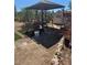 Serene backyard retreat featuring a swing set, perfect for relaxation and outdoor enjoyment at 626 Kimberly Ave, Pahrump, NV 89060