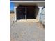 Outdoor dog kennel with shaded area and fenced enclosure for pet safety at 626 Kimberly Ave, Pahrump, NV 89060
