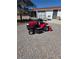 Gravel driveway and outdoor area featuring a lawnmower at 626 Kimberly Ave, Pahrump, NV 89060
