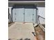 Detached garage with double doors, offering secure parking or storage space at 626 Kimberly Ave, Pahrump, NV 89060