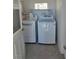 Bright laundry room featuring a modern washer and dryer at 626 Kimberly Ave, Pahrump, NV 89060