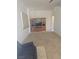 Spacious living room with a large window and entertainment center for a cozy feel at 626 Kimberly Ave, Pahrump, NV 89060