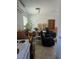 Neutral living space featuring chairs, tables, bookcases and tiled floors at 626 Kimberly Ave, Pahrump, NV 89060