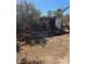 Wood storage shed in a wooded lot at 626 Kimberly Ave, Pahrump, NV 89060