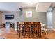 Comfortable dining area with seating for six and stairs to the second level at 6312 Snap Ridge St # 101, North Las Vegas, NV 89081