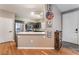 Modern kitchen featuring stainless steel appliances, dark cabinetry and plenty of countertop space at 6312 Snap Ridge St # 101, North Las Vegas, NV 89081