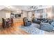 Open-concept living area connects the kitchen and living room, creating a spacious and inviting atmosphere at 6312 Snap Ridge St # 101, North Las Vegas, NV 89081