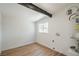 A brightly lit laundry room features new flooring and a window at 6320 Dayton Ave, Las Vegas, NV 89107