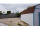 View of the backyard with a storage shed and block fence, providing ample space at 6432 Jean Lee Dr, Las Vegas, NV 89108