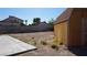 Backyard view features a storage shed and large patio area for outdoor activities and relaxing at 6432 Jean Lee Dr, Las Vegas, NV 89108