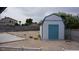 Backyard view featuring a new storage shed and ample space ready for customization at 6432 Jean Lee Dr, Las Vegas, NV 89108