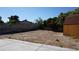 Spacious backyard features a storage shed and block wall, awaiting your personal touch for landscaping at 6432 Jean Lee Dr, Las Vegas, NV 89108