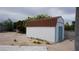 Backyard with shed is ready for outdoor activities, gardening, and entertainment at 6432 Jean Lee Dr, Las Vegas, NV 89108