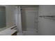 Bathroom featuring shower with white tiling and white shower curtain at 6432 Jean Lee Dr, Las Vegas, NV 89108