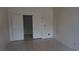 Empty room featuring neutral paint and light-colored flooring at 6432 Jean Lee Dr, Las Vegas, NV 89108