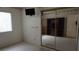 Comfortable bedroom featuring hardwood floors and a large window at 6432 Jean Lee Dr, Las Vegas, NV 89108