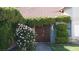 Close up of the front entrance showing a double door entry and mature landscaping at 6432 Jean Lee Dr, Las Vegas, NV 89108
