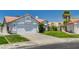 Charming single story home with well manicured lawn, desert landscaping and two car garage at 6432 Jean Lee Dr, Las Vegas, NV 89108