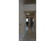 Hallway featuring tiled floor and neutral walls at 6432 Jean Lee Dr, Las Vegas, NV 89108
