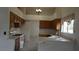 Open kitchen showcasing ample cabinetry, bright countertops, and modern appliances at 6432 Jean Lee Dr, Las Vegas, NV 89108