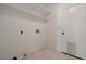 Laundry room with open shelving and back door at 6432 Jean Lee Dr, Las Vegas, NV 89108