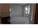 Living room with tile floors, shuttered windows and room for dining at 6432 Jean Lee Dr, Las Vegas, NV 89108
