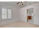 Living room featuring bright windows and tile floors at 6432 Jean Lee Dr, Las Vegas, NV 89108