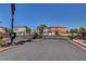 Gated community entrance with well-maintained landscaping offering added security and curb appeal at 644 Mauna Kea Pl, Henderson, NV 89011