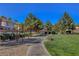 The community park has mature trees, a walking path, exercise bars, and plenty of green space at 644 Mauna Kea Pl, Henderson, NV 89011