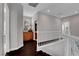 Second floor hallway features hardwood floors and natural light at 644 Mauna Kea Pl, Henderson, NV 89011