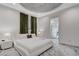 This bedroom has an ensuite bathroom and boasts a modern design with stylish lighting and marble floors at 6965 Tara Ave, Las Vegas, NV 89117