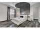 Elegant bedroom featuring a unique ceiling design and marble flooring at 6965 Tara Ave, Las Vegas, NV 89117