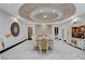 Elegant dining room featuring a decorative ceiling and a formal dining set for luxurious entertaining at 6965 Tara Ave, Las Vegas, NV 89117