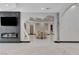 Sophisticated dining area with modern fireplace and elegant accents at 6965 Tara Ave, Las Vegas, NV 89117