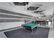 Stylish game room with a pool table, wet bar, and comfortable seating, perfect for entertainment at 6965 Tara Ave, Las Vegas, NV 89117