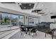 Spacious game room with pool table, card table, and sliding glass doors overlooking the pool at 6965 Tara Ave, Las Vegas, NV 89117