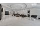 Expansive living area features marble flooring, modern furniture, and ample space for entertaining guests at 6965 Tara Ave, Las Vegas, NV 89117