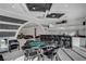 Spacious recreation room with a wet bar and game table, ideal for entertaining guests at 6965 Tara Ave, Las Vegas, NV 89117