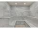 Luxurious steam room with marble seating, walls and flooring at 6965 Tara Ave, Las Vegas, NV 89117