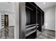 Organized walk-in closet featuring ample storage and marble flooring at 6965 Tara Ave, Las Vegas, NV 89117